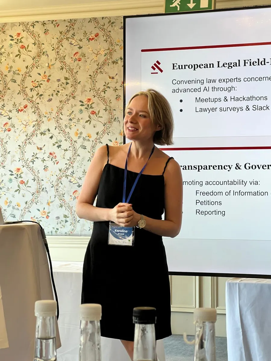 Karolina Gruzel giving a talk at the Unlocking the Potential of Women in AI Safety seminar